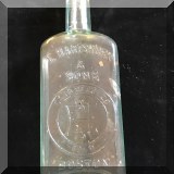 G31. Vintage glass bottle marked E. Hartshorn and Sons. 6”h - $8 